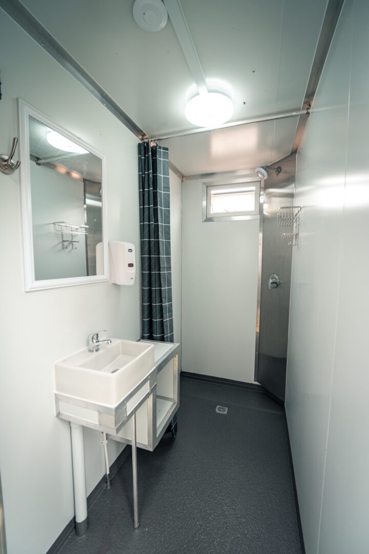 Luxurious mobile ablution units with warm showers and hangers