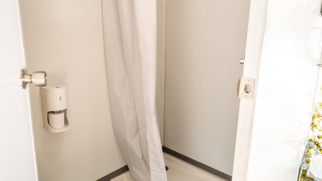 Luxurious mobile ablution units with warm showers and hangers