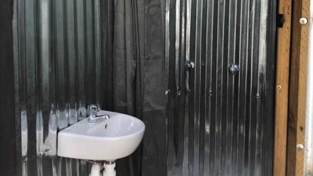 Luxurious mobile ablution units with warm showers and hangers