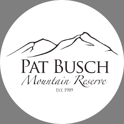 Couple enjoying glamping tent with scenic backdrop