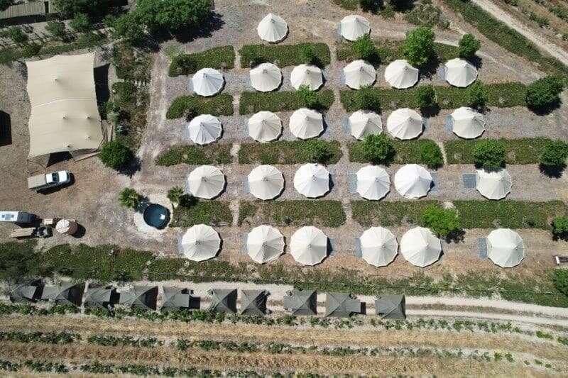 Wedding glamping village set up at event location