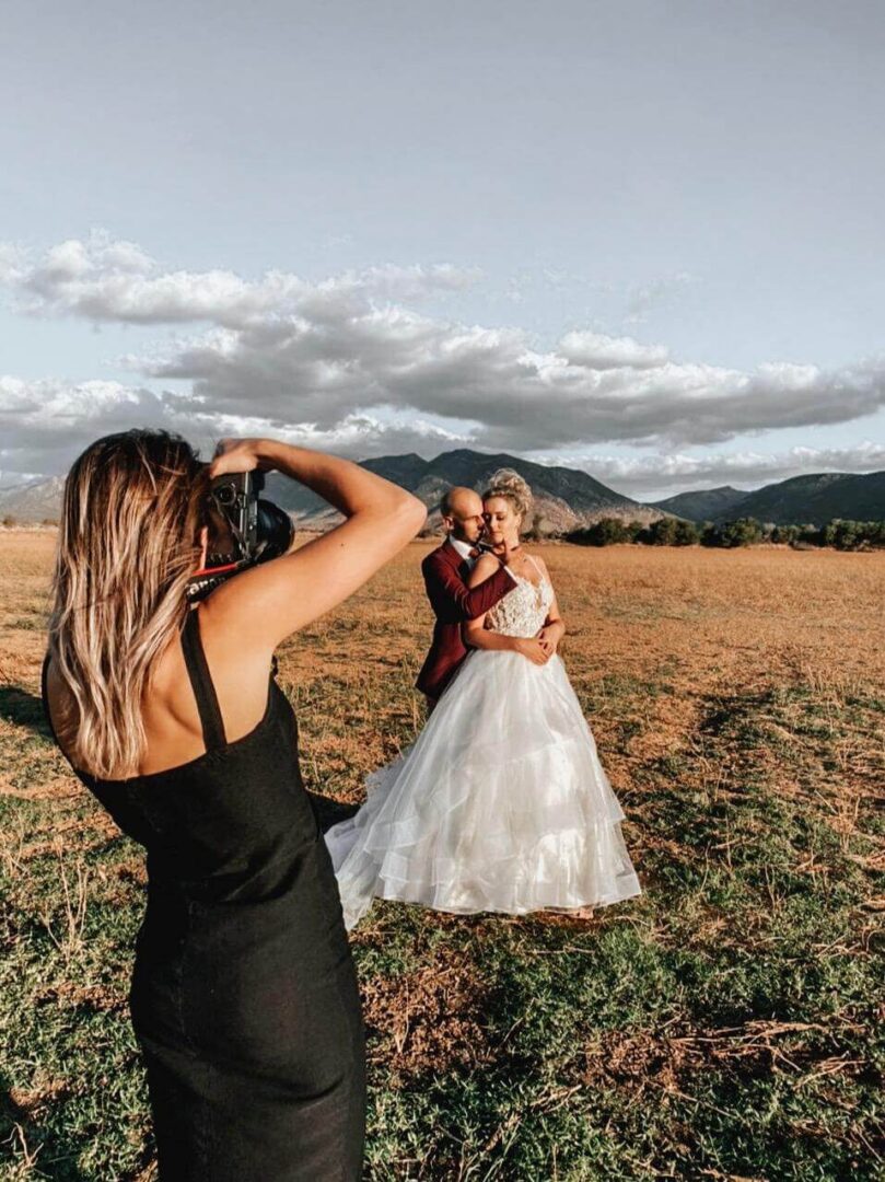 Interior of glamping tent with two full-size single beds and hotel linen
