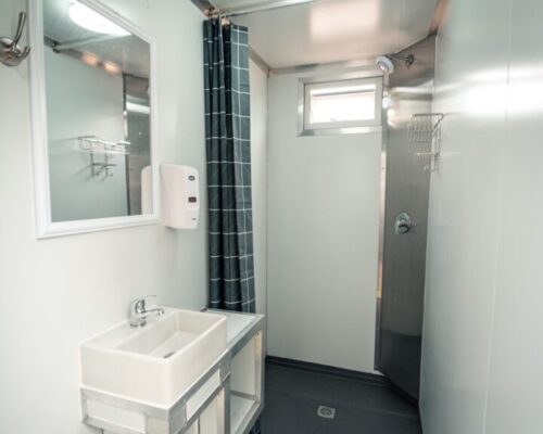 Luxurious mobile ablution units with warm showers and hangers