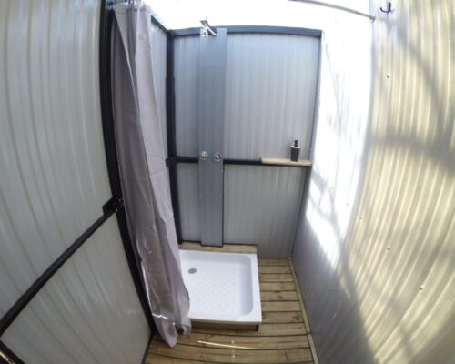 Luxurious mobile ablution units with warm showers and hangers